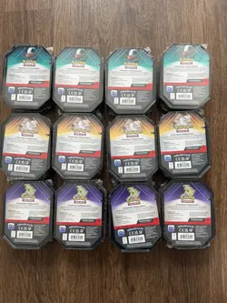 Pokemon TCG Triple Whammy Tins - 12 Factory Sealed 36 Booster Packs total - Image 2