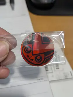 Pokemon Victini Red Mini Coin With Nothing On Back - Image 1