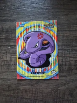 Pokemon - Topps- 4 of 10 Stoned #24 Arbok - Puzzle Chase Card - Blue Logo - Image 1