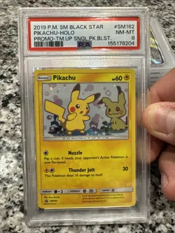Pikachu SM162 Pokemon: Sun & Moon Promo Mint PSA 8 Swirl Behind Ear - Image 1