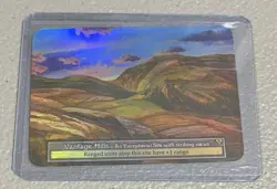 Sorcery Contested Realm: Alpha Vantage Hills Foil - Image 1