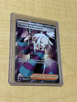 112/86 - MINT- Pokemon TCG Roxie's Performance- Protected Day 1 Ultrapro - Image 1
