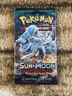 Pokemon TCG Sun Moon Guardians Rising Booster Pack Sealed - Image 1