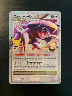 Carte Pokemon : Carchacrok Niv. X 145/147 Celebrations 25 ans Francaise NEUF - Image 1