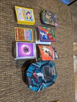 Lot Of 307 pokemon card and tins - Image 1