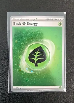 Pokemon TCG Basic Leaf Energy Cosmic Holo SVE 001 Pokemon - Image 1