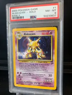 2000 Pokemon Base 2 # 1 Alakazam Holo PSA 8 Card NM-M - Image 1