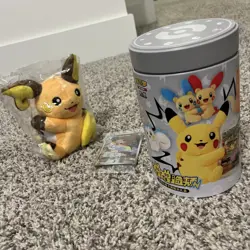Pokemon TCG Chinese Tin with Mystery Plush & TCG Card Raichu - Image 1