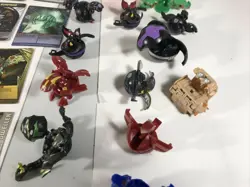 Large Lot Of Bakugan Cards And Figurines - Image 3