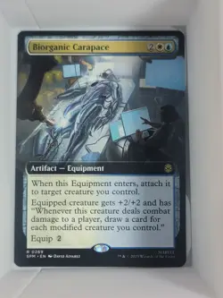 x1 Biorganic Carapace regular Extended Art R MTG Marvel's Spider-Man M/NM, Engl - Image 1