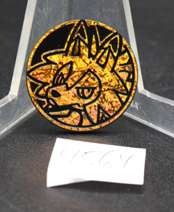 Pokemon Limited Edition Cosmic Gold Lycanroc Coin - Image 1
