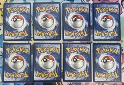 Pokemon Prismatic Cosmo Promo Cards 8 Mini Tin Evolutions Costco Pack - Image 2