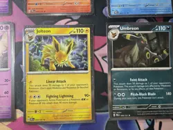 Pokemon Prismatic Cosmo Promo Cards (8) Mini Tin Evolutions Costco Pack - Image 2