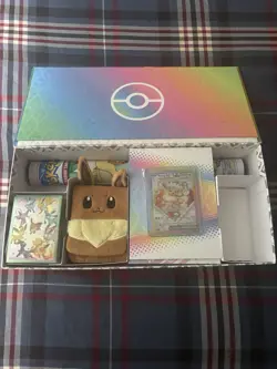 Prismatic UPC Box w/ Plush Eevee Deck Box, Sleeves, Mat & Promo Card (NO PACKS) - Image 1