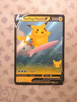 Pokemon TCG Surfing Pikachu v 008/025 Celebrations Ultra Rare NM Condition - Image 1