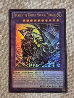 Timaeus the United Magical Dragon MZMU-EN012 Ultra Rare Yugioh Maze of Muertos - Image 1