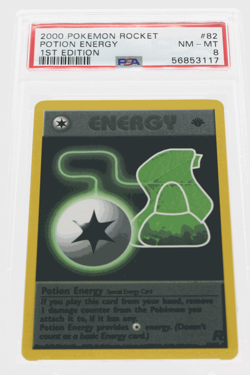 PSA 8 NEAR MINT-MINT 2000 Pokemon Team Rocket #82 Potion Energy 1st Edition !!! - Image 1