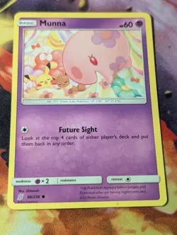 Munna 88/236 SM - Unified Minds Regular Pokemon Card With Pikachu And Eevee - NM - Image 1