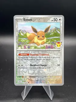 Eevee (74/131) [Reverse Holo] (NM) - Prismatic Evolutions Pokemon Day 2025 Promo - Image 1