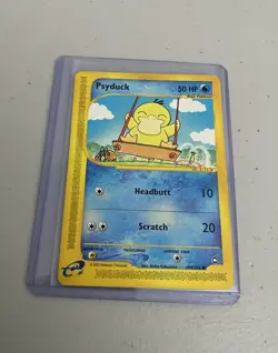 Pokemon TCG Aquapolis Psyduck Card 104/147 2002 Regular LP *Corner Damage* - Image 1