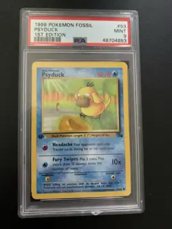 1999 Pokemon Fossil Psyduck #53 1st Edition PSA 9 - Image 1