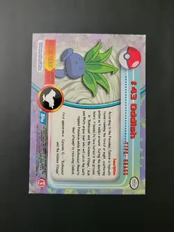 HP! 1999 Topps Pokemon TV Animation #43 Oddish RAINBOW FOIL BLUE Logo - Image 2