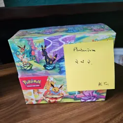 Pokemon Prismatic Evolutions Mini Tin Display Case - Sealed Case 8 Tins - Image 1