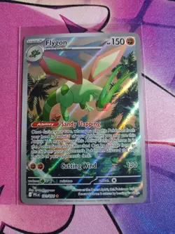 Flygon 101/094 Me02: Phantasmal Flames Holo Pokemon Tcg - Image 1