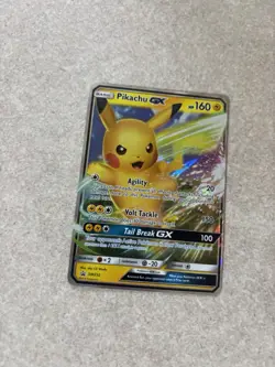 Pokemon TCG 2019 Pikachu GX Holo Black Star Promos SM232 - Image 1