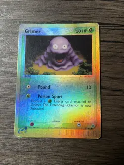 Grimer 57/97 Dragon Reverse Holo e-reader card - Image 1