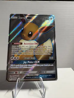 Pokemon TCG Eevee GX Black Star Promo Holo SM242 - Image 1