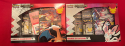 POKEMON CELEBRATIONS LANCE'S CHARIZARD V + DARK SYLVEON V COLLECTION BOXES - Image 1