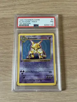 1999 Pokemon 1st Edition Base Set Shadowless Alakazam PSA 7 Holo - Image 1