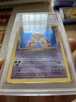 1999 Pokemon 1st Edition Base Set Shadowless Alakazam PSA 7 Holo - Image 4