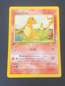 CARTE POKEMON SALAMECHE 46/102 EDITION 1 COMMUNE SET DE BASE - NM+ - Image 1