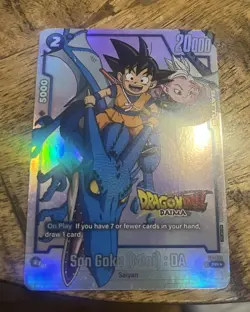 NYCC 2024 Exclusive DBS Daima Son Goku Trading Card + bonus Akira Toriyama Manga - Image 1