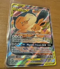 Pokemon Eevee & Snorlax GX TAG TEAM Promo Full Art Holo SM169 Card Moderate Play - Image 1