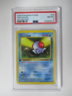 1999 Pokemon Fossil 1st Edition Tentacool #56/62 PSA 8 - Image 1