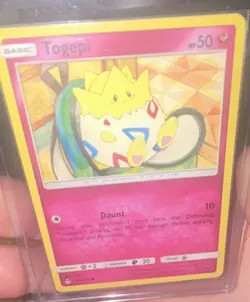 The Pokemon Company Togepi 136/214 Unbroken Bonds Basic 50 HP EN - Image 1