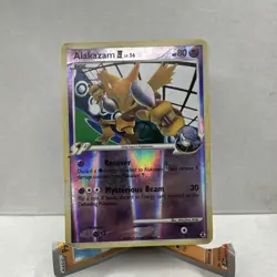 2009 Pokemon Platinum Rising Rivals 38/111 Alakazam Reverse Holo LP Rare Card - Image 2