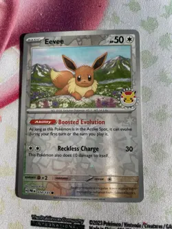 Eevee - (Pokemon Day 2025) (Reverse Cosmos Holo) - Image 1