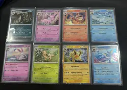 Pokemon Prismatic Evolutions Costco Cosmos Holo Eevee Evolution Set Of 8 Swirls - Image 1