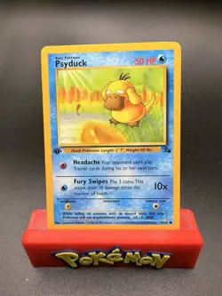 VINTAGE 1999 POKEMON PSYDUCK 53/62 1st EDITION FOSSIL NM/LP - Image 1