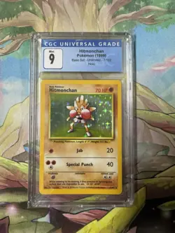 CGC 9 Pokemon TCG Hitmonchan Base Set 7 Holo Unlimited Holo Rare - Image 1