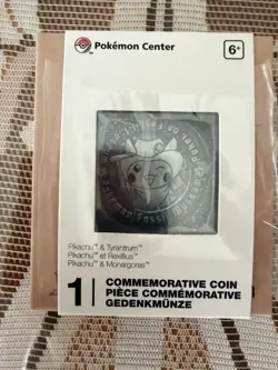 Pokemon Fossil Museum: Excavator Pikachu & Tyrantrum Skeleton Commorative Coin - Image 1