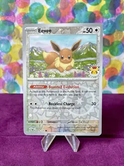Eevee (74/131) [Reverse Holo] (NM) - Prismatic Evolutions Pokemon Day 2025 Promo - Image 1