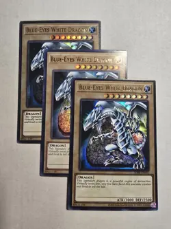 YUGIOH TCG 3X BLUE-EYES WHITE DRAGON SDBE-EN001 ULTRA UNLIMITED EDITION - Image 1