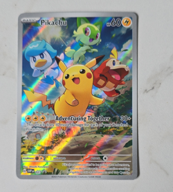 The Pokemon Company Pikachu Promo Holo English SVP 027 2023 60HP Adventuring - Image 1