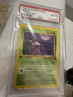 1999 Pokemon Fossil Grimer #48 1st Edition PSA 10 - Image 1