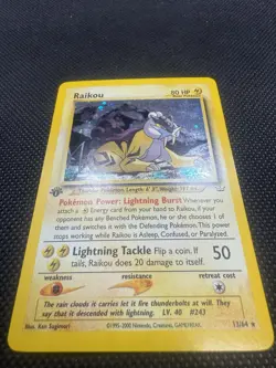 1st Edition Raikou 13/64 Ultra Rare Holo Pokemon Card NM Neo Revolutions Vintage - Image 2